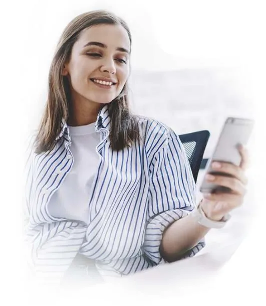 a woman holding a phone